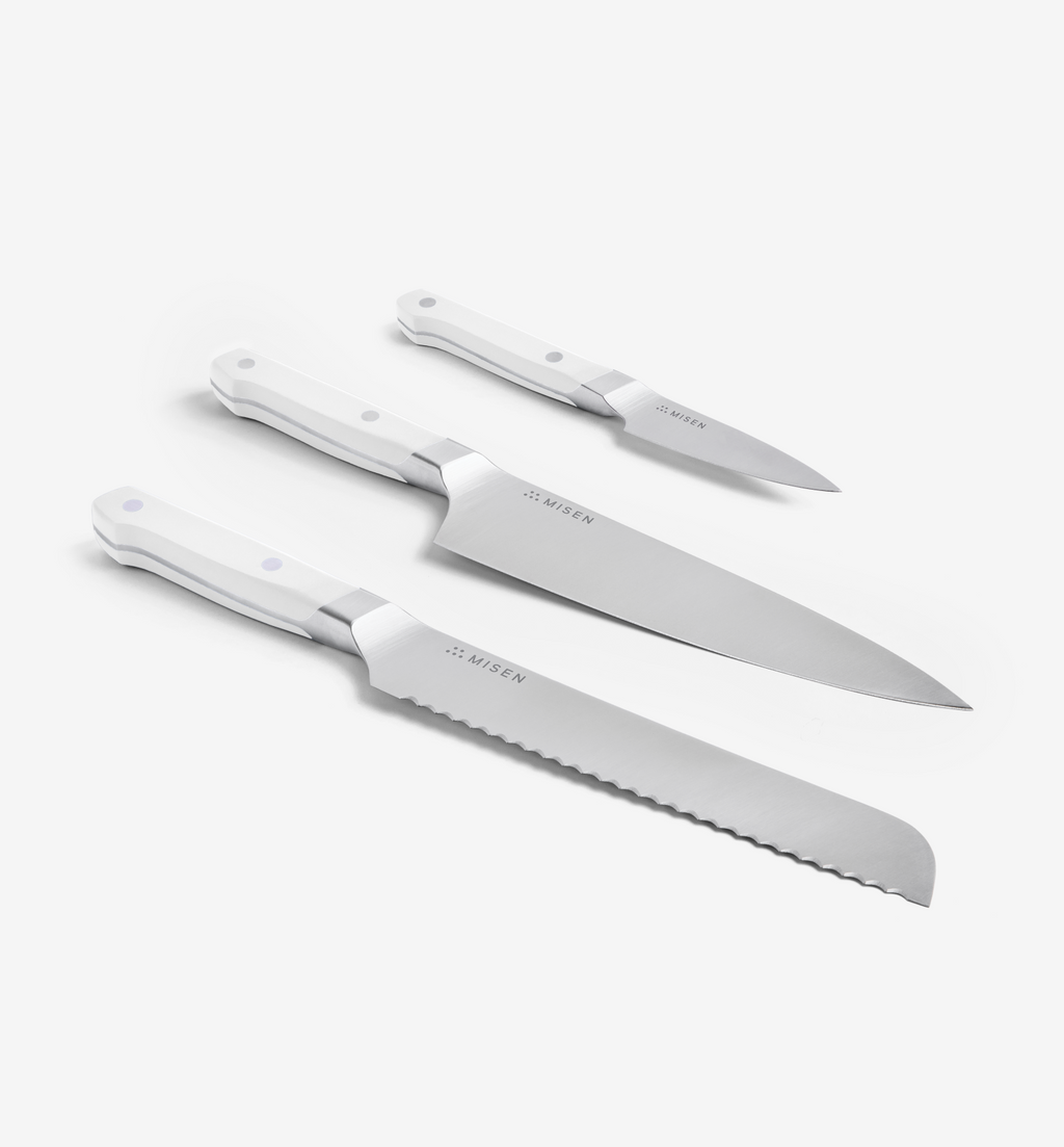 Misen 3-piece kitchen knife set with white handles including chef, bread, and paring knives