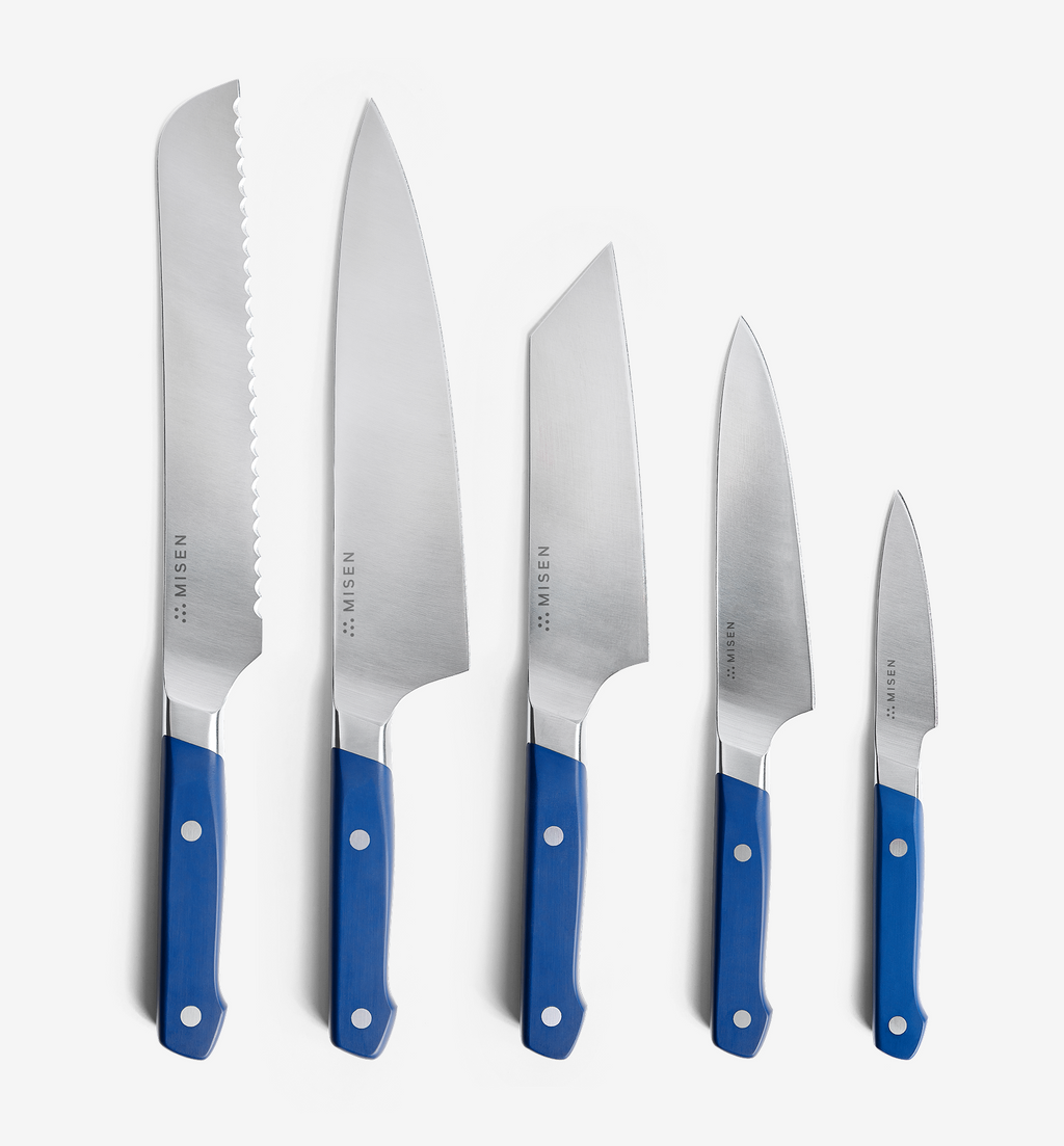 Misen 5-piece kitchen knife set with blue handles arranged by size