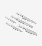 Misen 5-piece kitchen knife set with white handles including chef, bread, santoku, utility, and paring knives