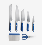 Misen 7-piece kitchen knife set with blue handles including bread, chef, santoku, utility, paring knives, shears, and bench scraper