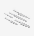 Misen 5-piece kitchen knife set with white handles including chef, bread, santoku, utility, and paring knives