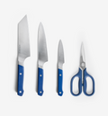 Misen 4-piece knife set with blue handles including chef's knife, santoku, paring knife, and kitchen shears