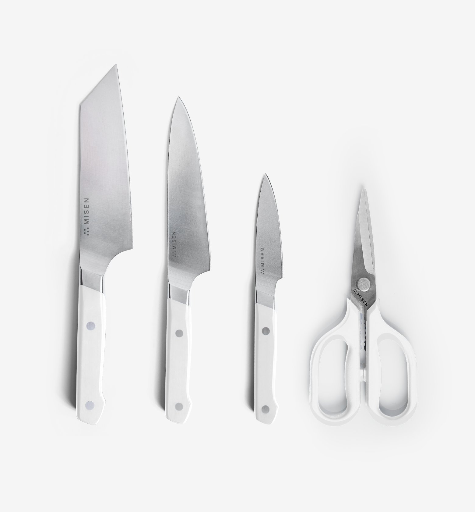 Misen kitchen knife set with chef knife, santoku, paring knife, and shears in white