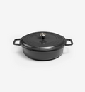 Black enameled cast iron braiser with lid and dual handles