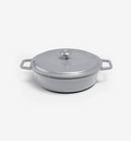 Grey enameled cast iron shallow casserole dish with lid and dual handles