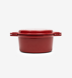 Red enameled cast iron Dutch oven with lid and side handles