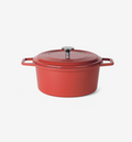 Red enameled cast iron Dutch oven with lid and stainless steel knob