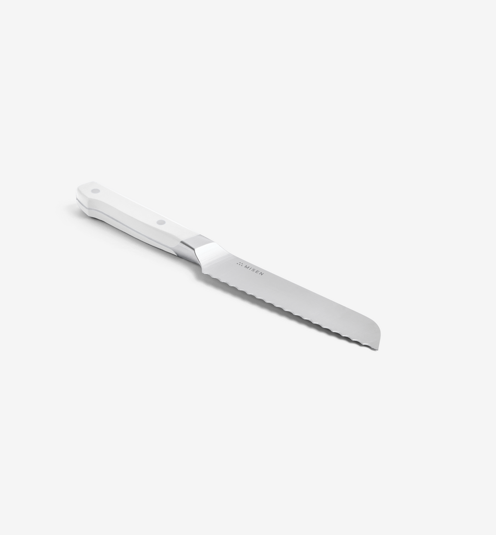 Misen serrated bread knife with white handle and stainless steel blade