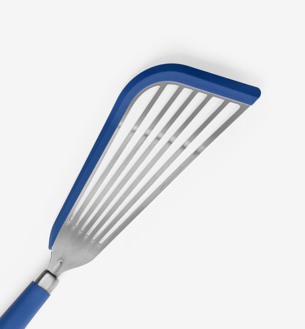 Slotted spatula with blue silicone edge guard and stainless steel head