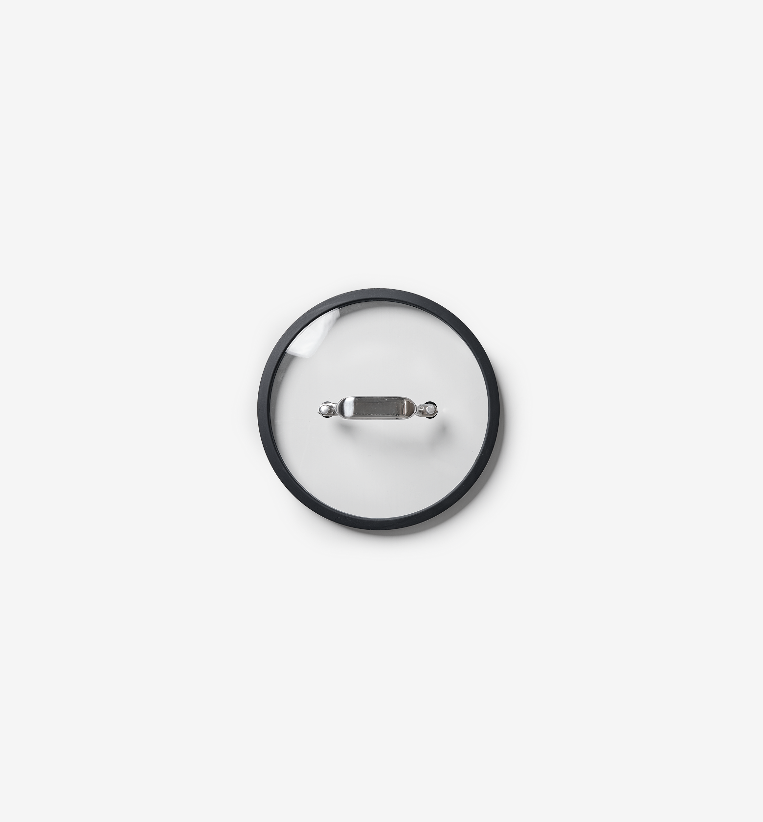 Glass pot lid with stainless steel handle and silicone rim, top view