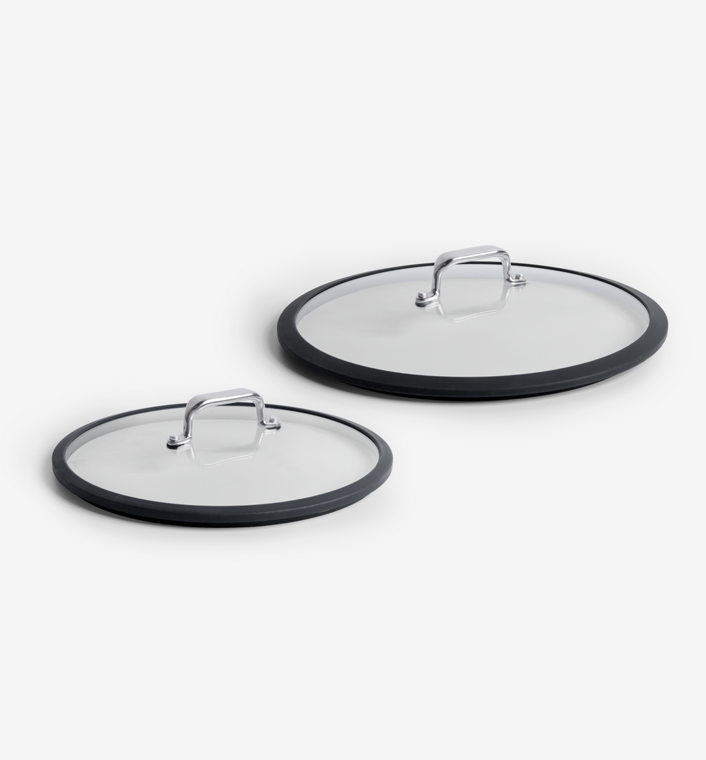 Glass cookware lids with silicone rim and stainless steel handle, set of two sizes