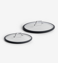 Glass cookware lids with silicone rim and stainless steel handle, set of two sizes