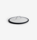 Glass pan lid with black silicone rim and stainless steel handle