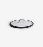 Glass pan lid with black silicone rim and stainless steel handle
