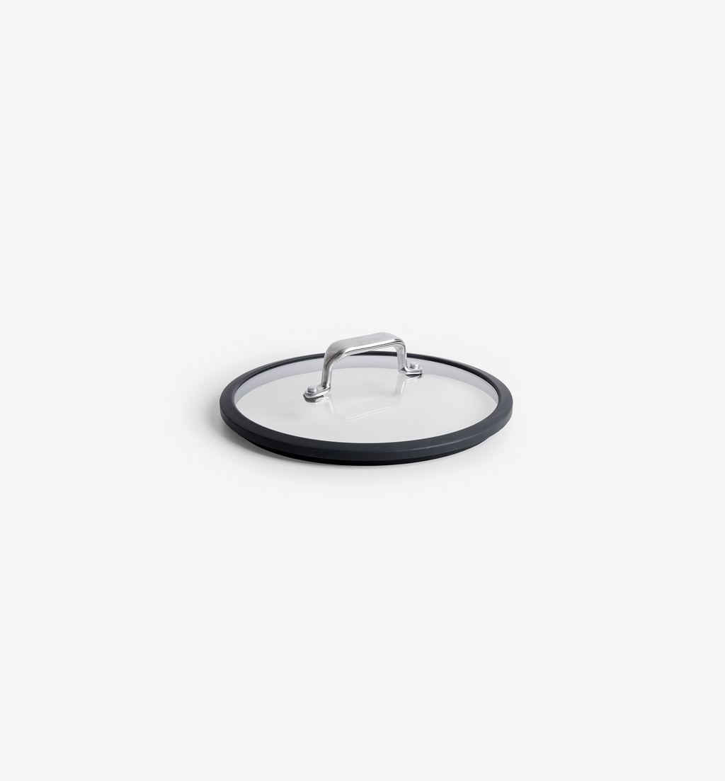 Glass pan lid with stainless steel handle and black silicone rim
