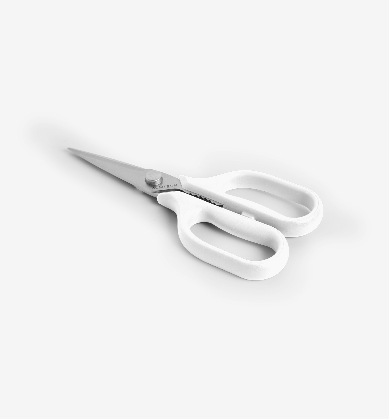 Misen kitchen scissors with white handles and stainless steel blades