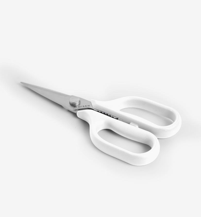 Misen kitchen scissors with white handles and stainless steel blades