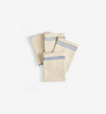 Cream linen kitchen dish towels with blue stripes, set of four folded