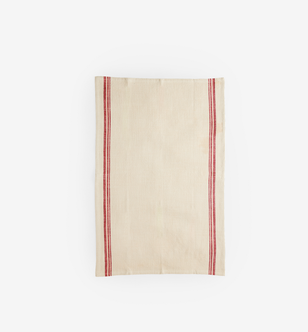 French linen kitchen towel with red stripes on cream background