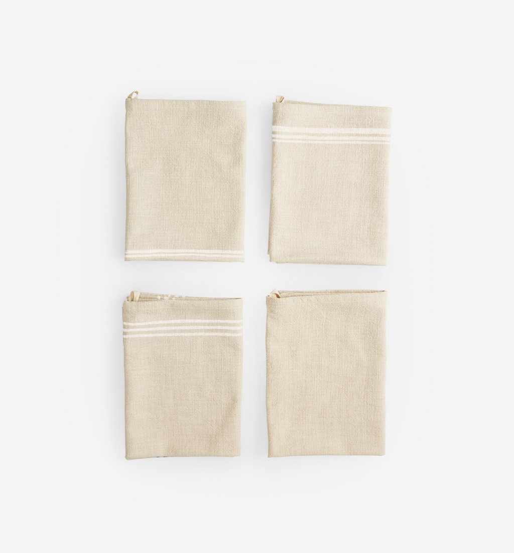 Natural linen kitchen towels with white stripe detail, set of four folded