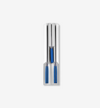Three-piece knife set with blue handles stored in white magnetic knife block