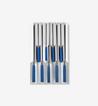 Set of knives with blue handles stored in a stainless steel knife block organizer