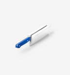 Kitchen knife with blue handle inserted into white knife sharpener block