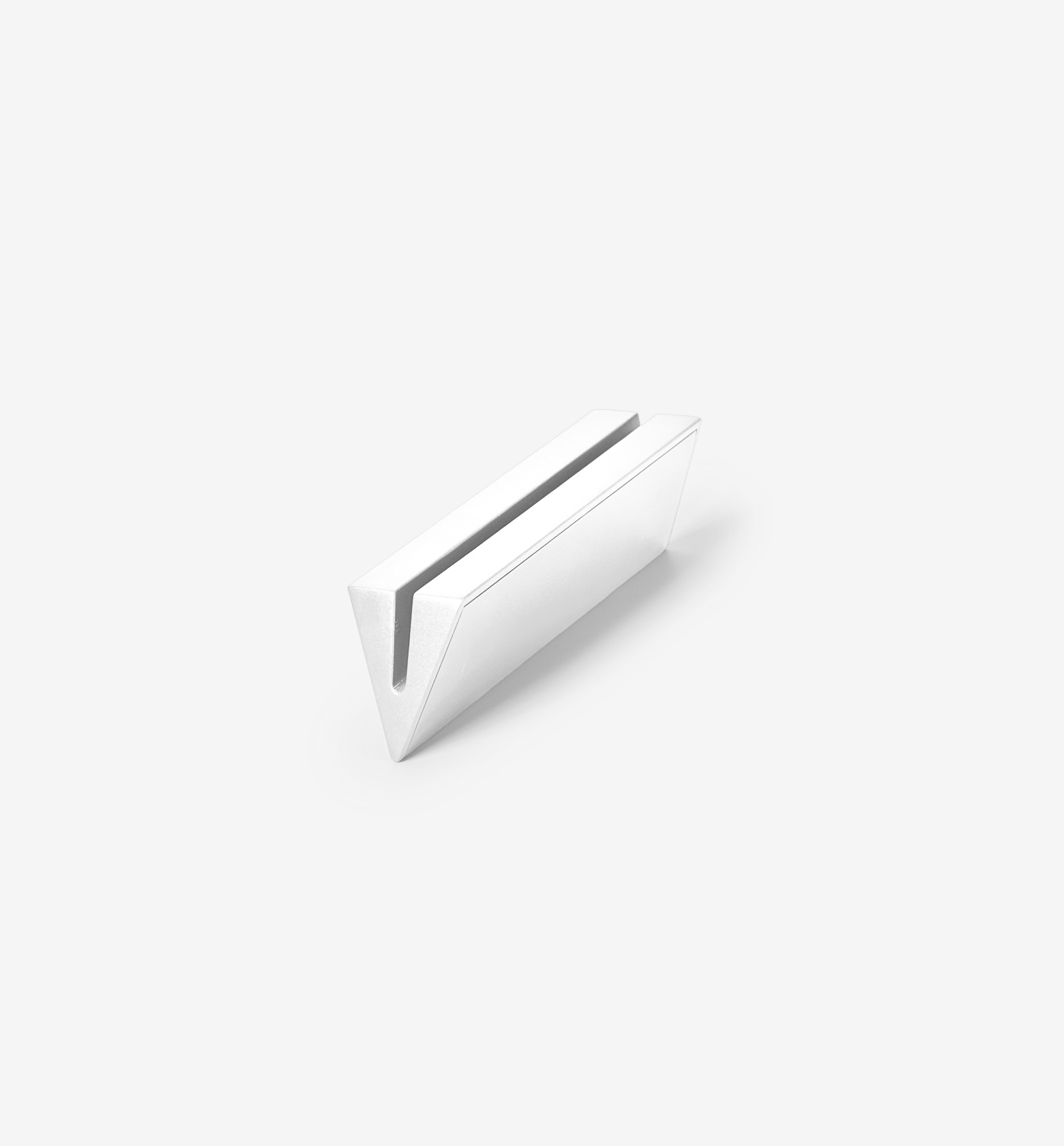 White minimalist card holder or laptop stand with V-shaped slot