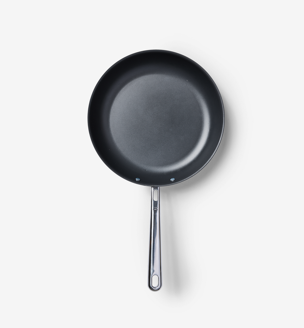 Nonstick frying pan with stainless steel handle, top-down view