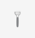 Y-peeler with stainless steel blade and gray non-slip handle