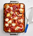 Detroit-style sheet pan pizza with mozzarella, salami, and red onion in Misen baking pan