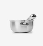 Misen stainless steel saucier pan with handle resting inside