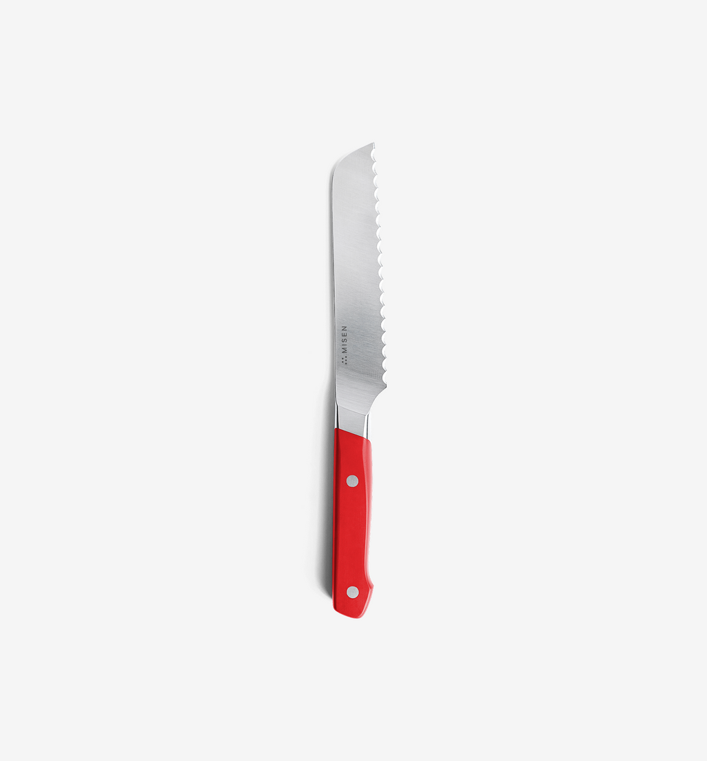 Misen bread knife with red handle and serrated stainless steel blade