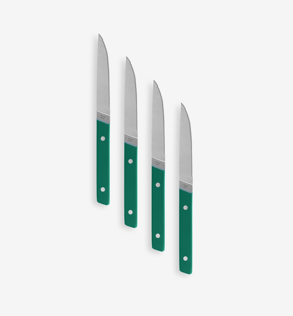 Set of 4 serrated steak knives with green handles and stainless steel blades