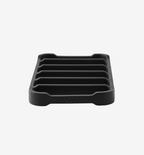 Black silicone soap dish with ribbed drainage design