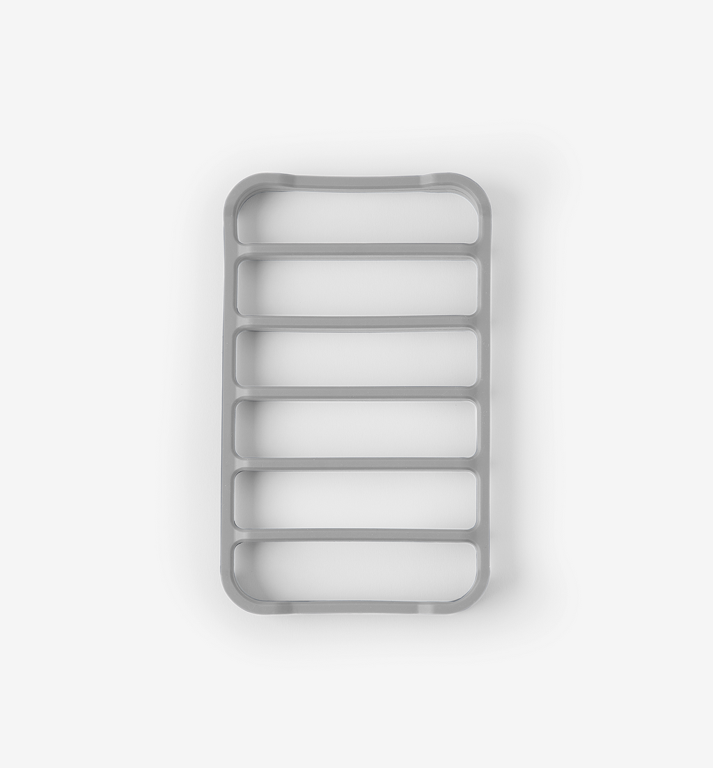 Gray silicone trivet with rounded rectangular grid design for hot pots and pans