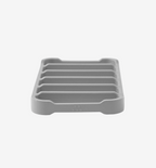 Gray silicone soap dish with ribbed drainage channels