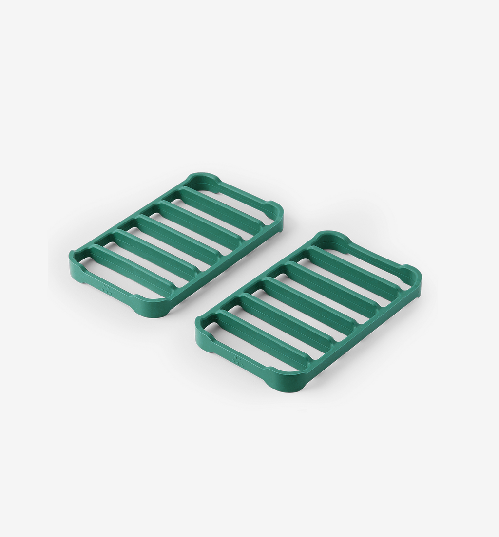 Green silicone trivets set of two with slatted design for hot pots and pans