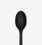 Black nylon perforated slotted spoon kitchen utensil with small drainage holes