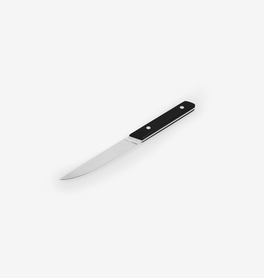 Misen steak knife with black handle and stainless steel blade