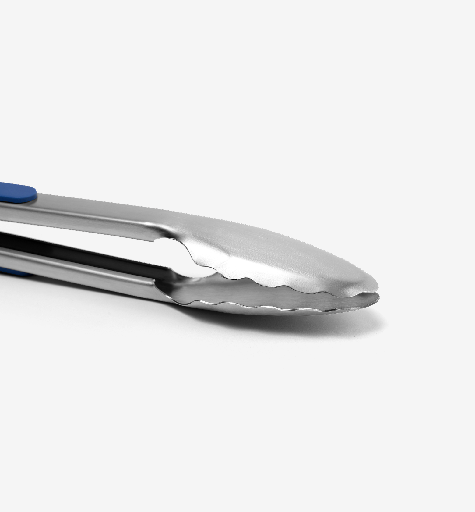 Stainless steel kitchen tongs with scalloped gripping edges and blue handle