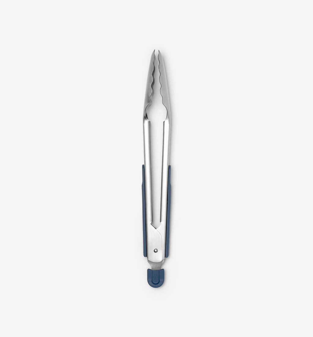 Stainless steel kitchen tongs with navy blue silicone grip and locking mechanism