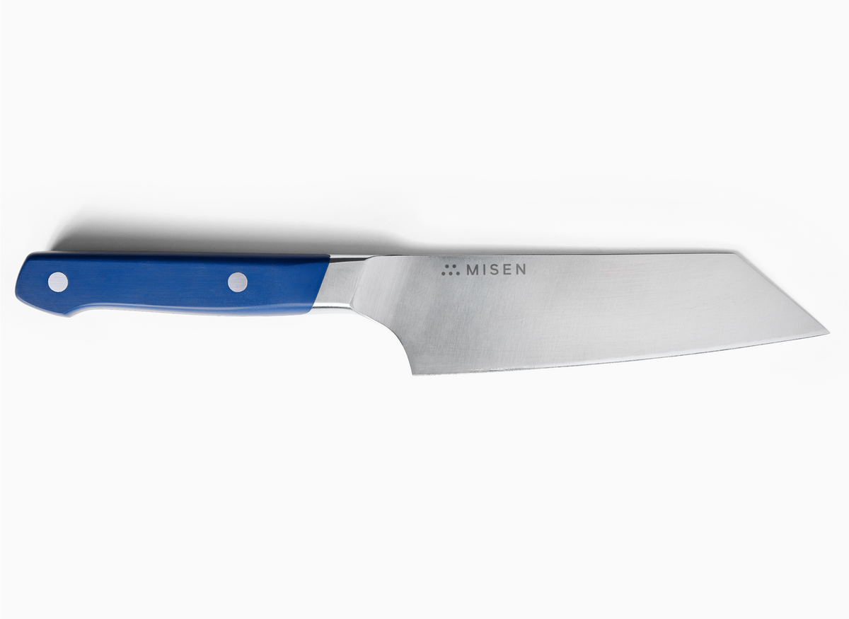 An ACUTO440 steel Misen 6 inch Bunka knife with a blue handle is shown on a white background. The Misen logo is visible on the blade.