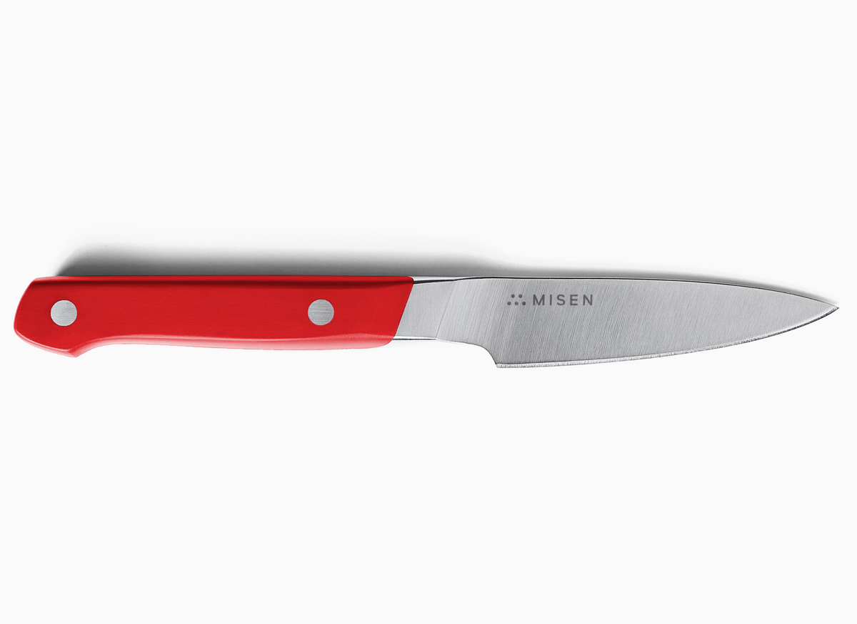A red-handled 3.5 inch Paring Knife 2.0 with the brand name "MISEN" engraved on the ACUTO440 steel blade.