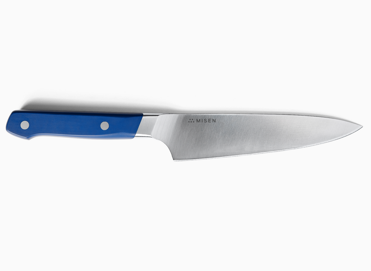 A side view of a blue-handled 5.5 inch Utility Knife 2.0 against a clean white background. The knife is positioned horizontally, with the handle on the left and the blade extending to the right. The silver-toned ACUTO440 steel blade is engraved with the word "MISEN" and a logo. The handle is a vibrant blue with two silver rivets visible.
