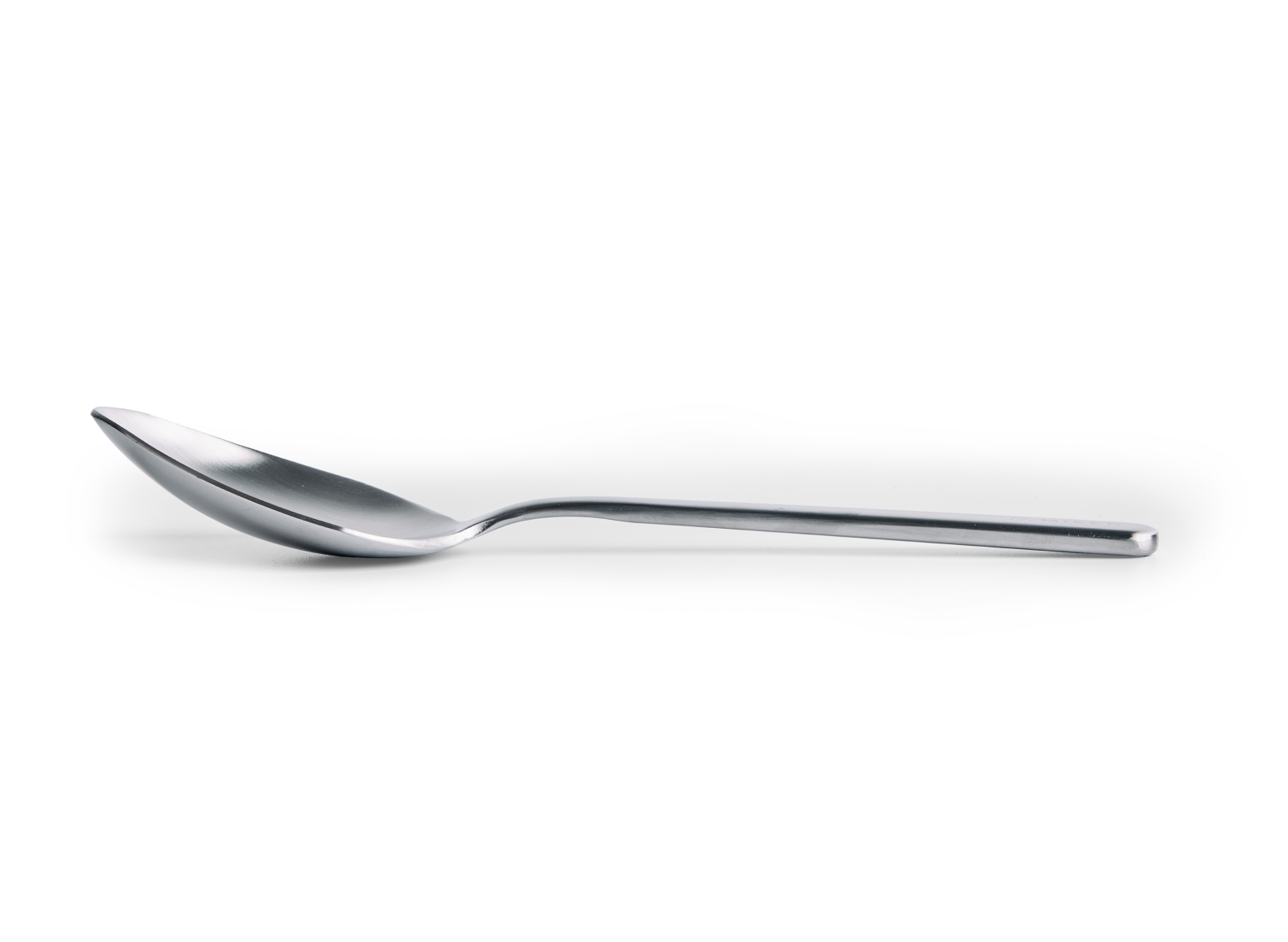 A Misen stainless steel plating spoon is positioned horizontally on a white background, viewed from the side. The spoon has a shallow, oval-shaped bowl with a polished finish and a long, slender handle with a matte finish.