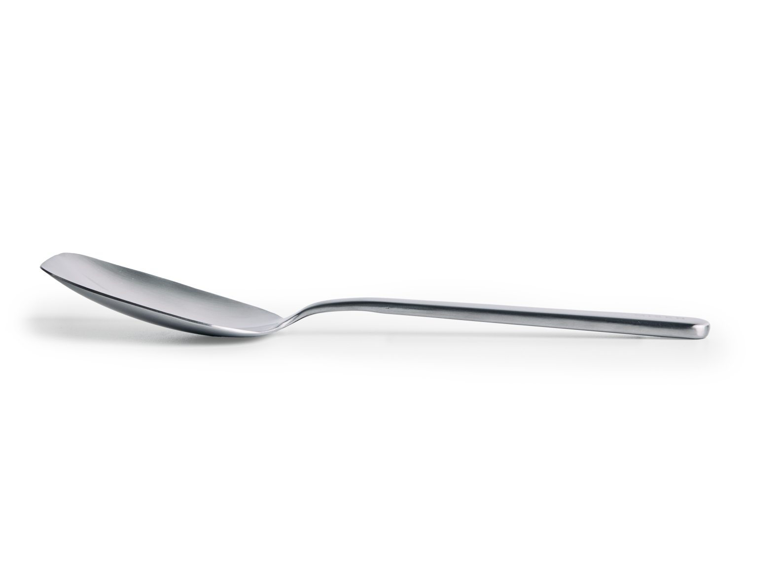 A stainless steel Misen Scraper Chef Spoon with a slightly flattened, rectangular bowl and a long, slender handle is positioned horizontally on a white background. The spoon has a brushed finish.