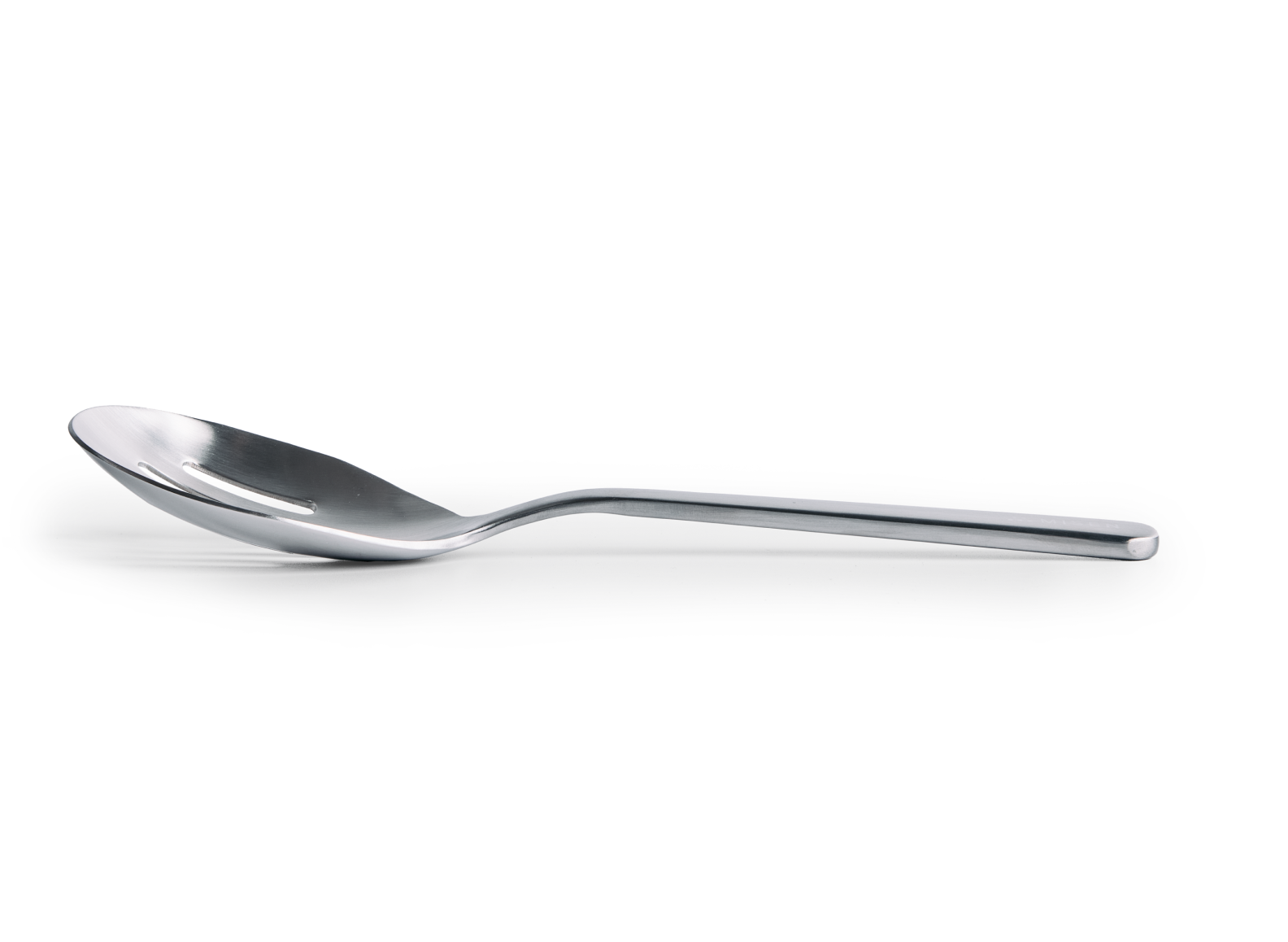 A Misen stainless steel slotted spoon is positioned horizontally on a white background, viewed from the side. The spoon has an oval-shaped head with four horizontal slots for drainage. The handle is slender and extends straight back from the bowl, with a slightly flattened end.