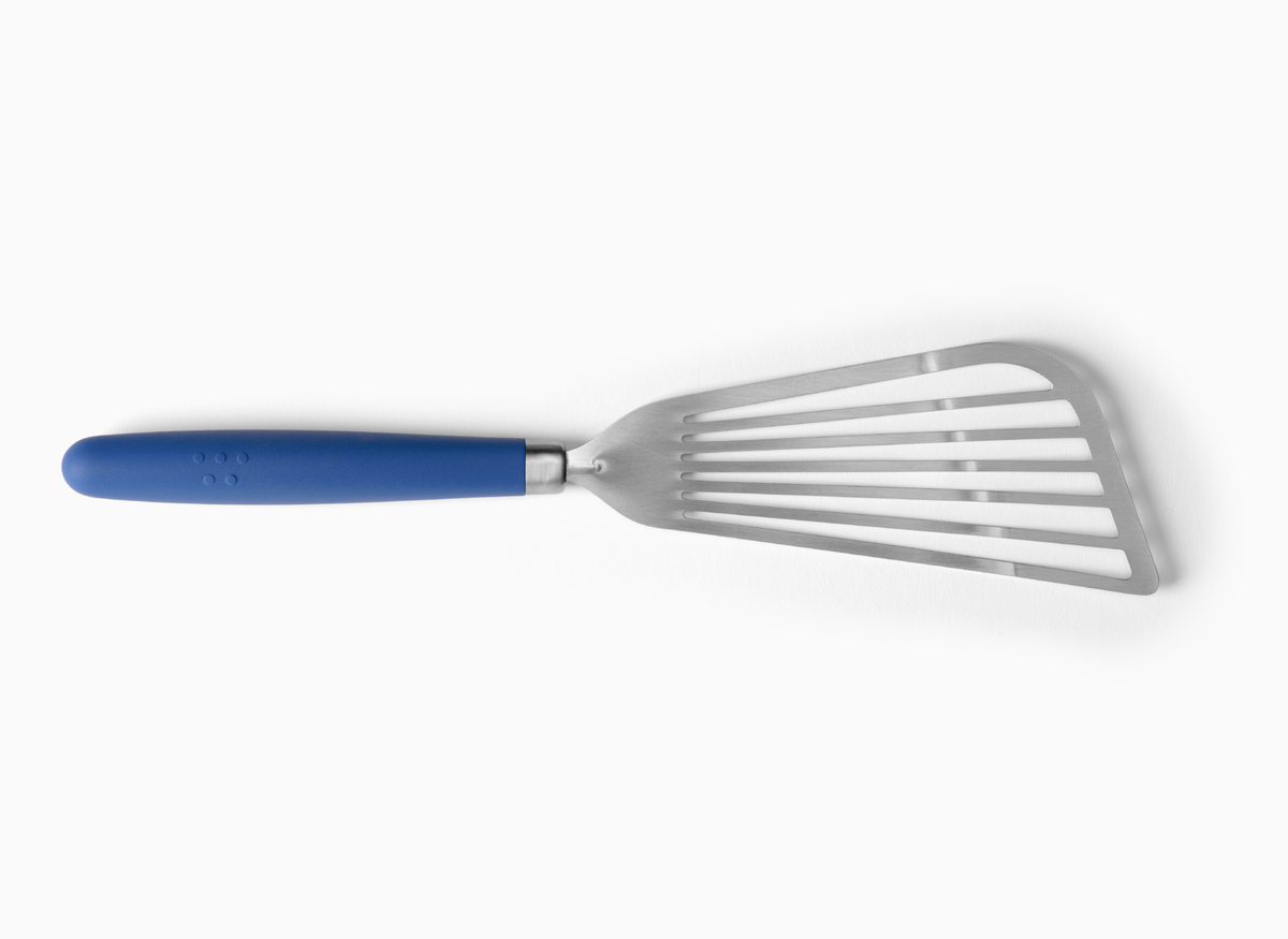 A Blue Misen Metal Fish Spatula on a white background. Shows a slotted and flared metal head attached to a silicone handle.