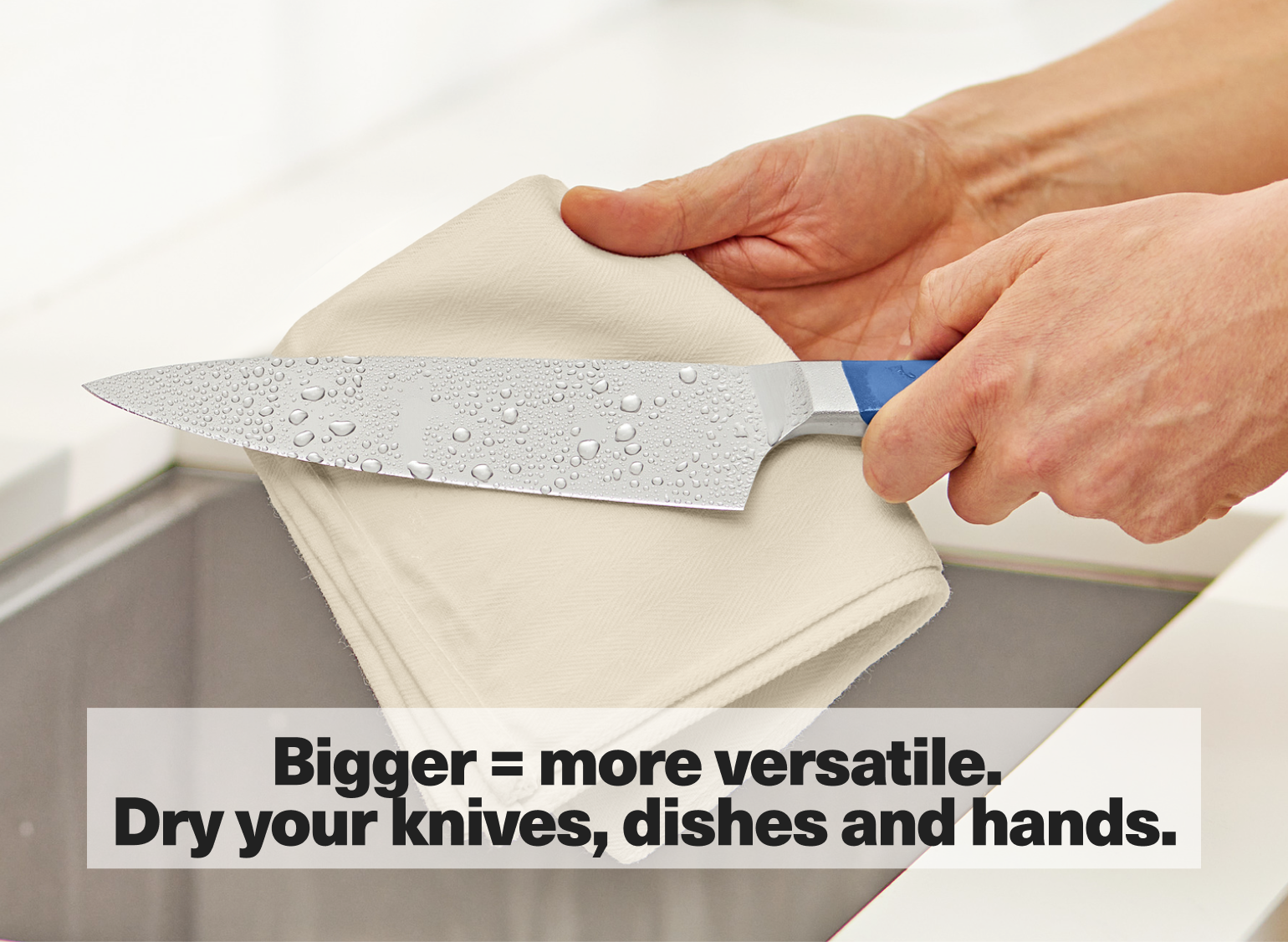 Bigger =  more versatile. Dry your knives, dishes and hands.